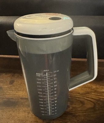 Baby Brezza Gray White Portable One Step Motorized Baby Formula Mixer Pitcher.