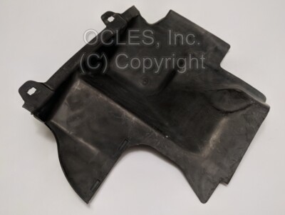 Genuine BMW E30 Headlamp splash guard. Driver 51711965241