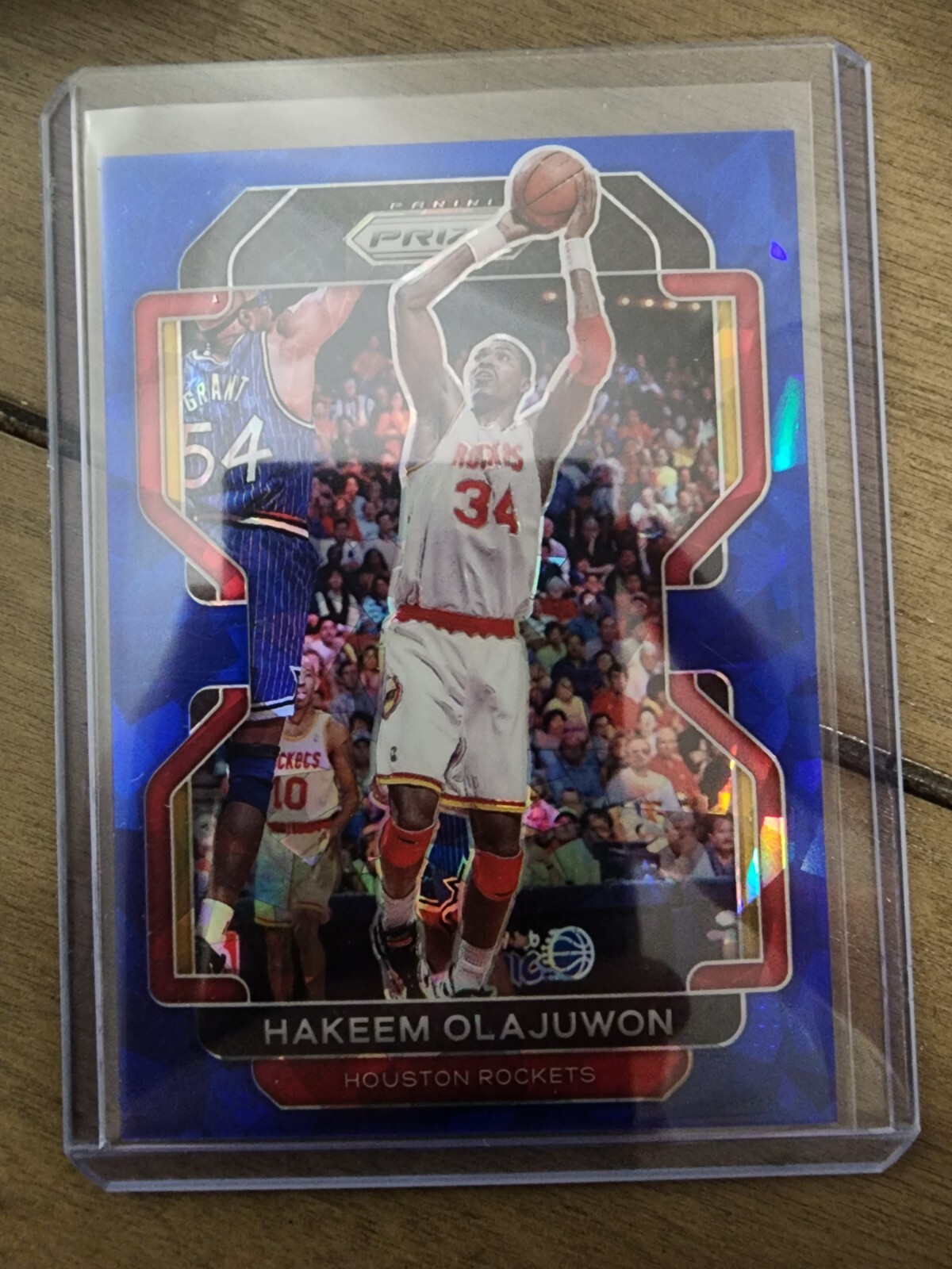 Hakeem Olajuwon 2021-22 Prizm #265 Blue Ice Prizm /125