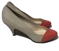 But Another Innocent Tale patent pumps. Size 8.