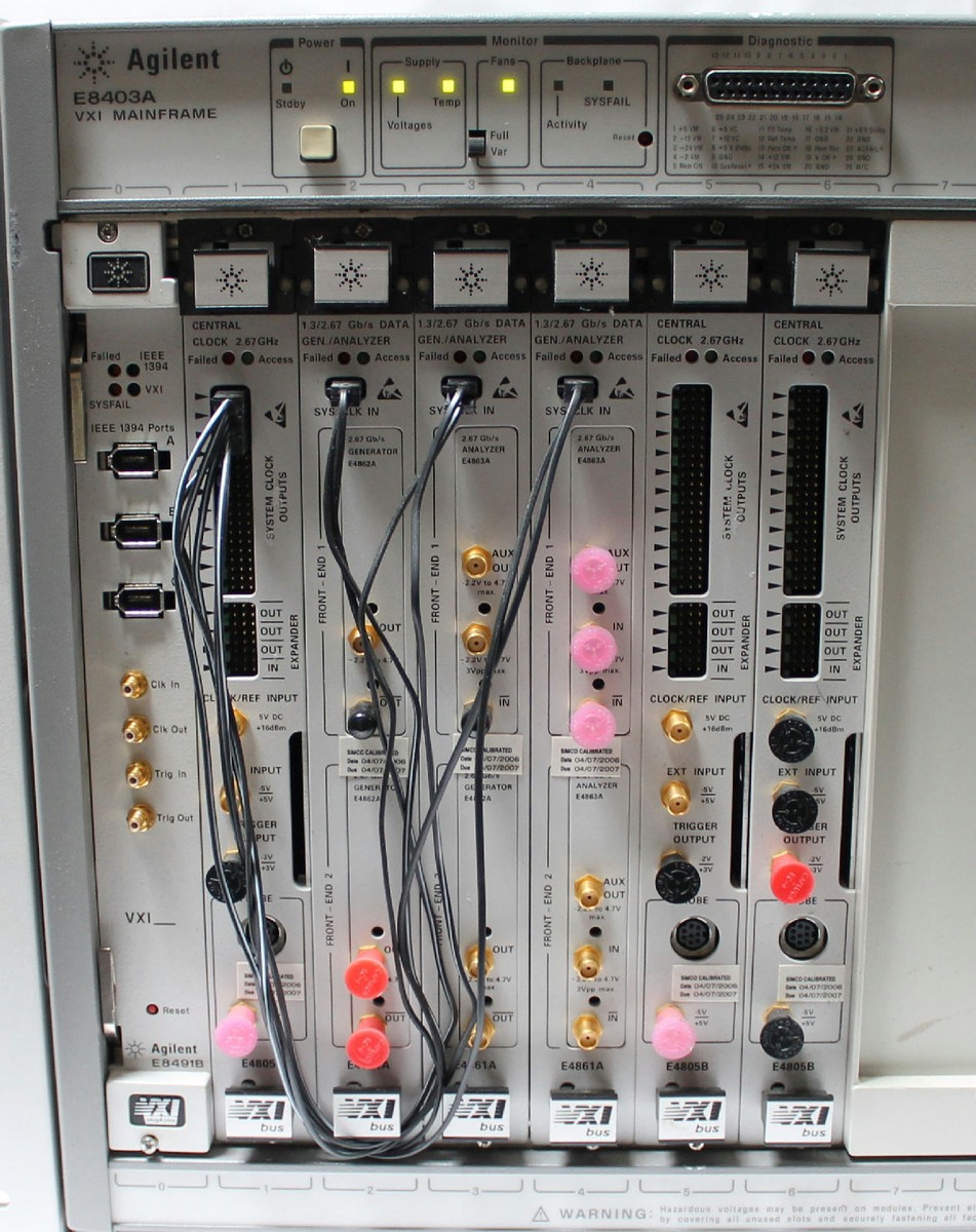 HP/Agilent E8403A VXI Mainframe w E8491B Firewire 3x E4805B Clock