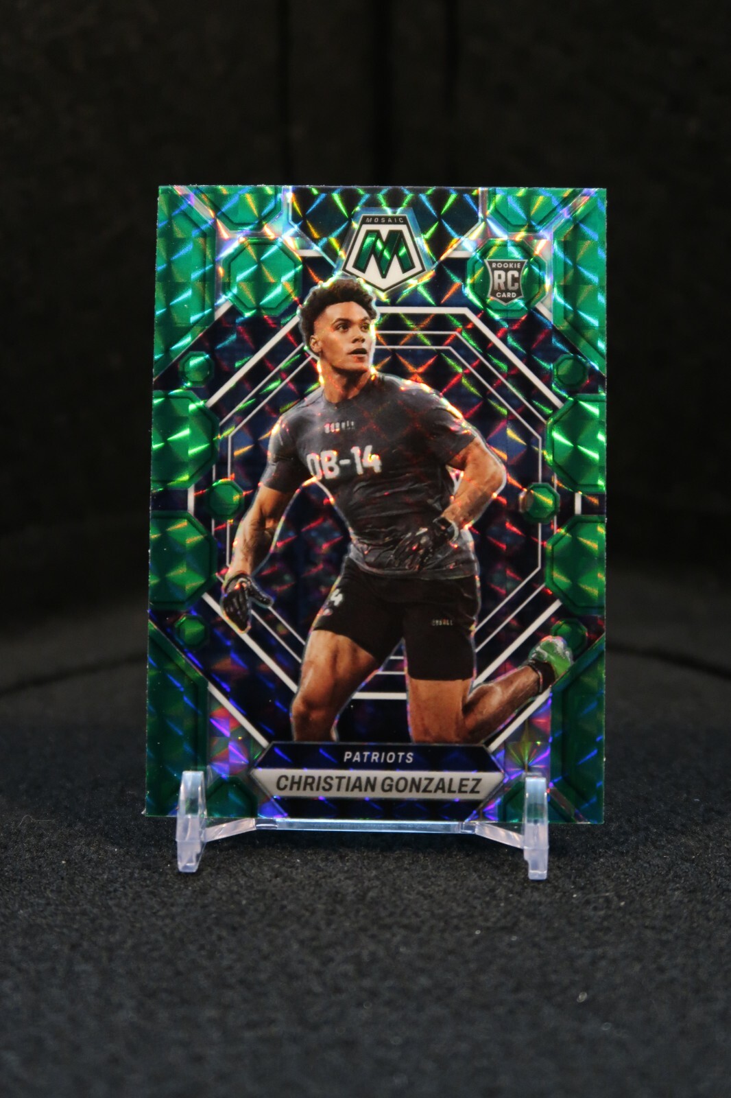 2023 Panini Mosaic - Rookies Green Mosaic Prizm #300 Christian Gonzalez (RC)