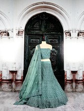 Indian green designer wedding net lehenga choli with heavy embroidery-Shahnoor