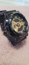 Casio G-SHOCK GA-110GB Quarz Armbanduhr Kunststoff schwarz/gold Y2K analog 200m