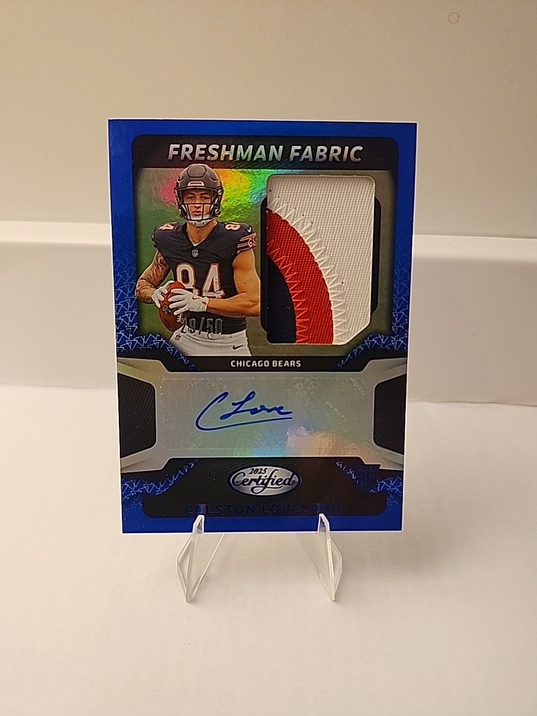 2025 Panini Certified Colston Loveland Freshman Fabric Blue RC Patch AUTO 29/50