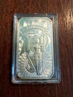 1 oz bar silver with plastic case.