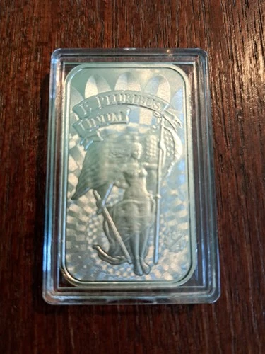1 oz bar silver with plastic case.
