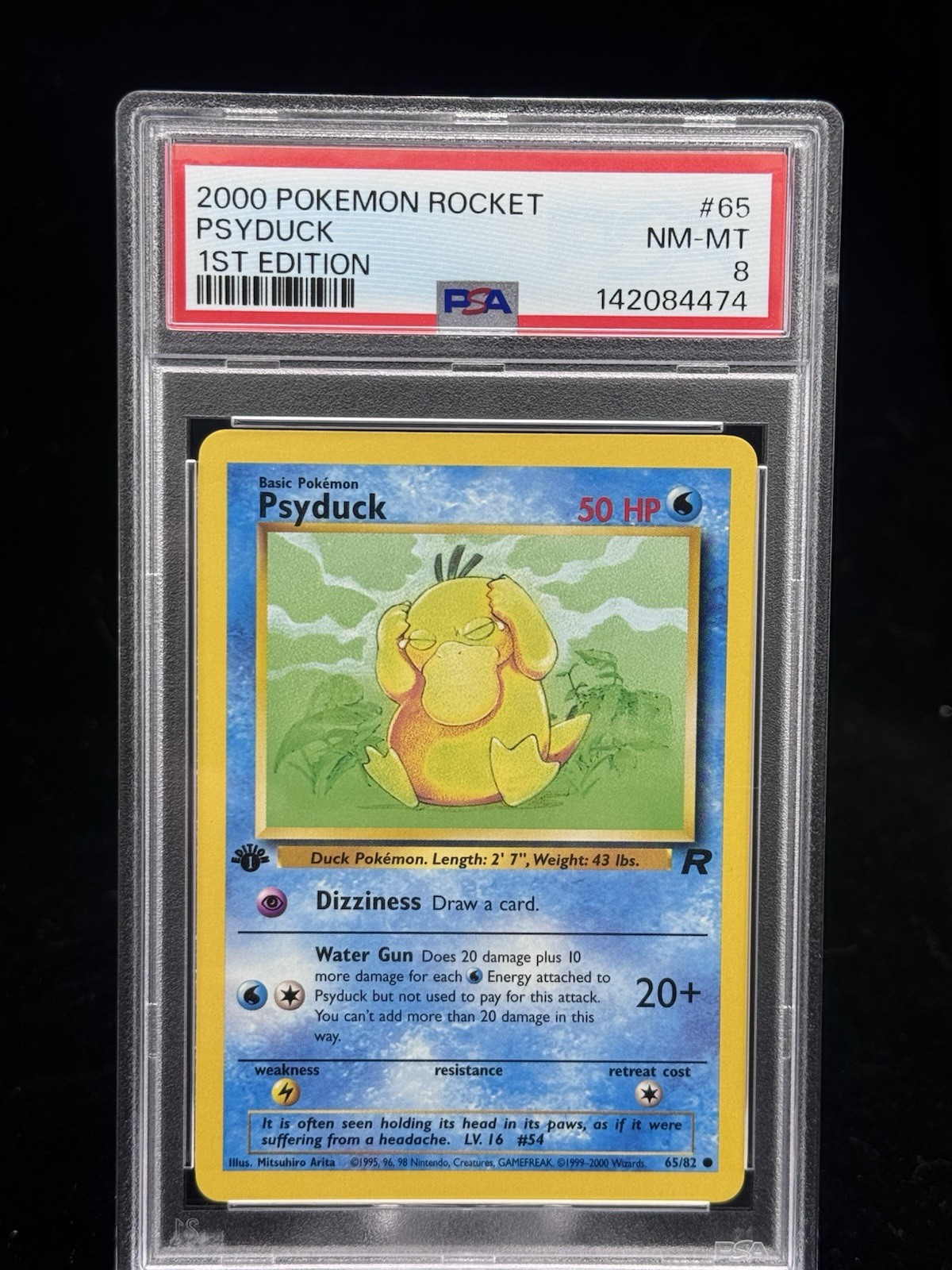 Psyduck #65 1st Edition Team Rocket 2000 Pokemon PSA 8 💦