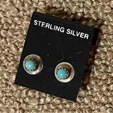 Sterling silver stud earrings with genuine tu...