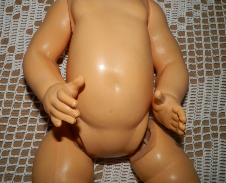 Jouet baigneur poupon Petitcollin celluloïd tête d'aigle 40
