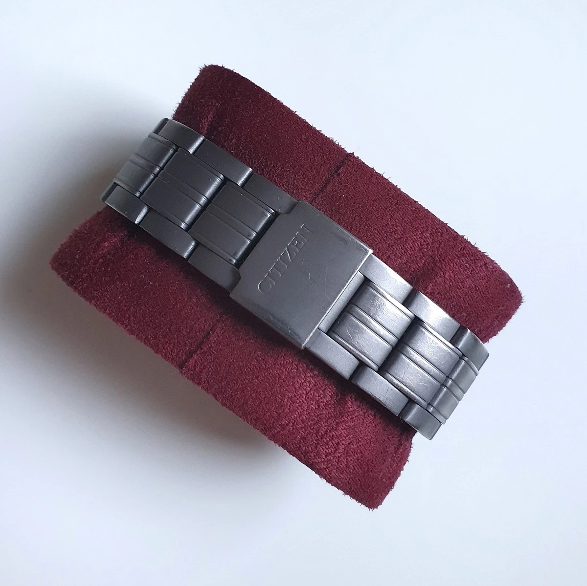 Reloj Citizen Titanium WR100 cuarzo pulido al sol esfera rosa - batería nueva