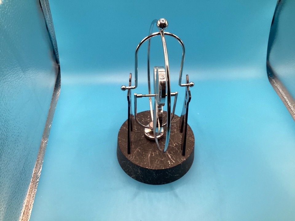 Revolving Gadget Perpetual Motion Desk Office Art Decor Toy