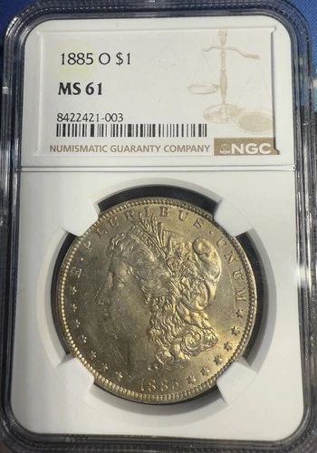 1885 O Morgan Silver $1 NGC MS 61 Golden Toning