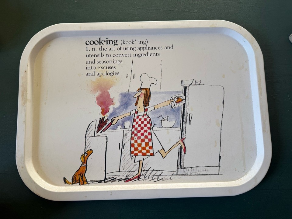 A 1985 Beard & McKie novelty cooking tray — a specific, dateable piece of illustrated humor kitsch that's genuinely collectible and displayable.