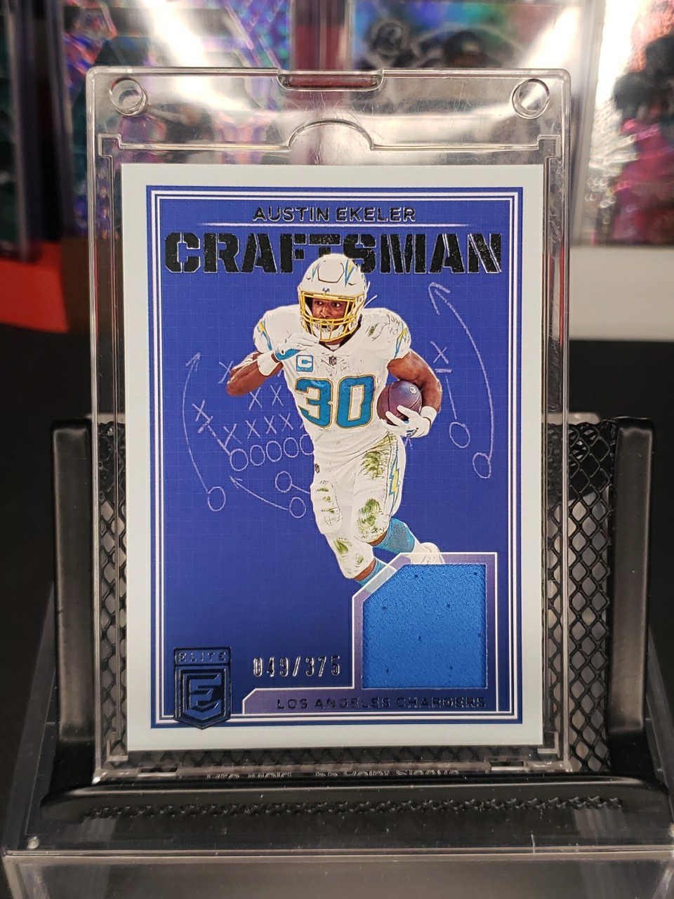 2023 Panini Donruss Elite - Craftsman Jerseys Austin Ekeler #4 /375 (MEM)