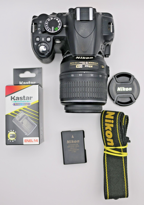 Nikon D3100 14.2MP DSLR Camera w/ 18-55mm VR Lens – 3K Shutter 