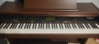 The Technics SX-PR53 is a vintage, 88-key weighted digital ensemble piano. — photo 2