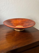 hand turned bowl; paduk with a spalted maple base; 13.5" wide by 3.25" tall