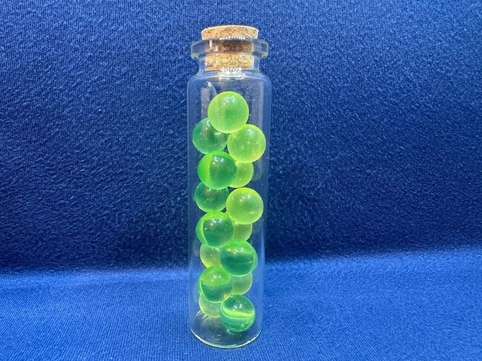 Uranium Glass Large Vile Of 15 Marbles 1cm Each, 8cm Tall Vile Green & Vaseline - image 2 of 4