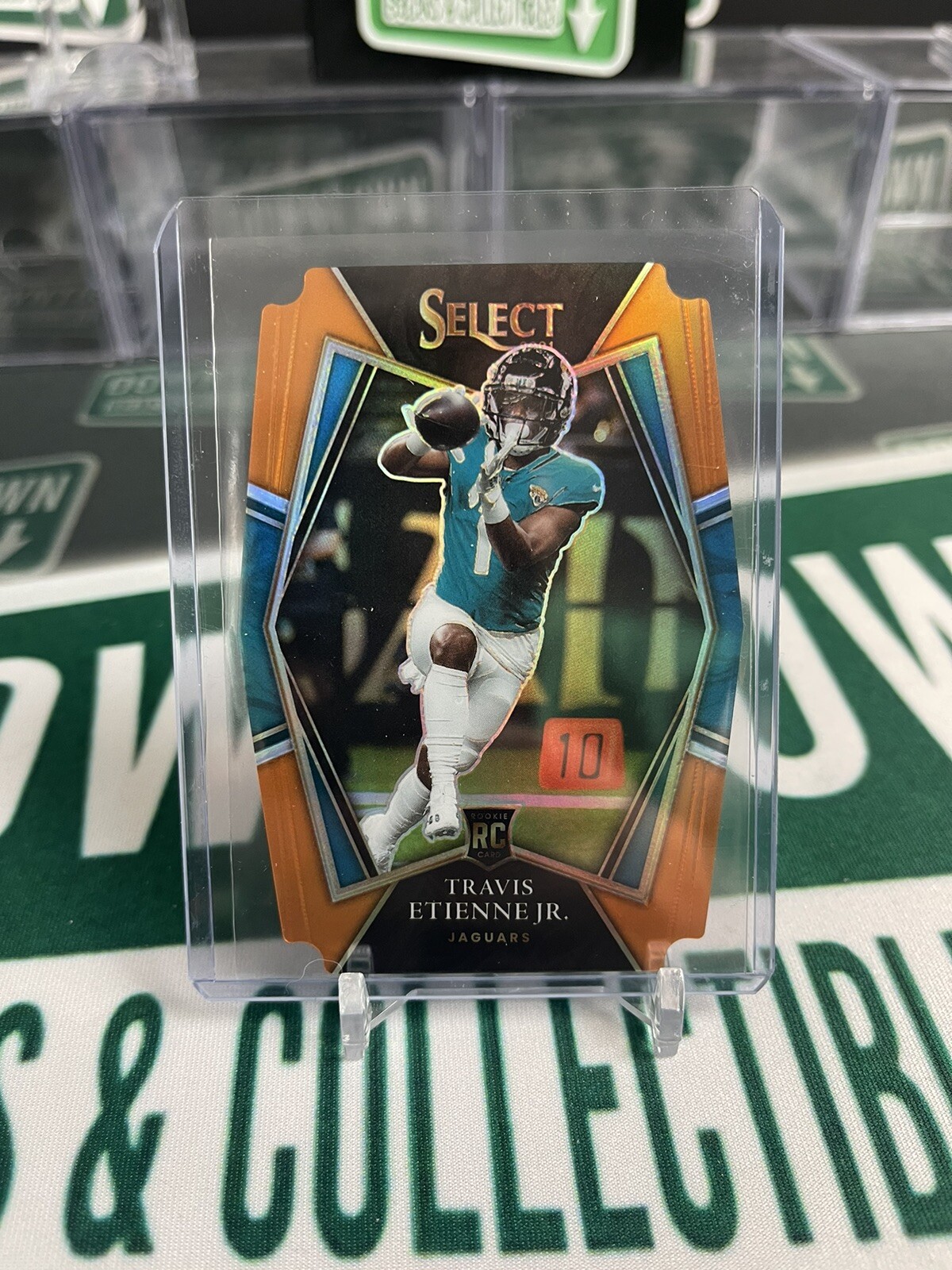 2021 Select Travis Etienne Jr. Orange /249 Die Cut Premier Level Rookie Jaguars