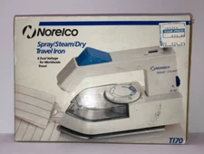Norelco TI70 Travel Iron/Spray/Steam/Dry Iron Folding Handle Dual Voltage NEW
