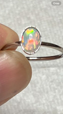  180B- .75ct Genuine Ethiopian Welo Opal set in a Size 9 Sterling Silver Ring
