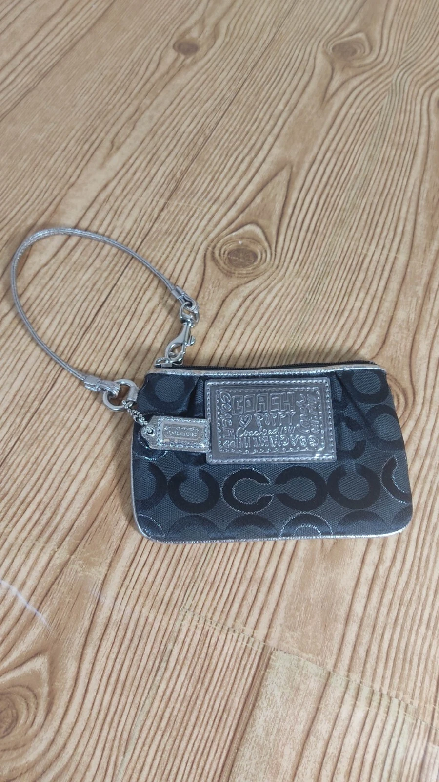 Borsa da polso Coach nera argento Op Art papavero firma papavero *leggi*