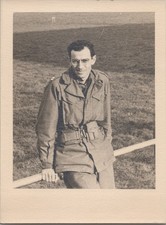 WW2 Photo of US Soldier Sitting On Rail At Muenchen Gladbach Germany
