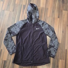 Nike Women s Essential Hooded Running Jacket Size Medium Dark Purple Lightweight