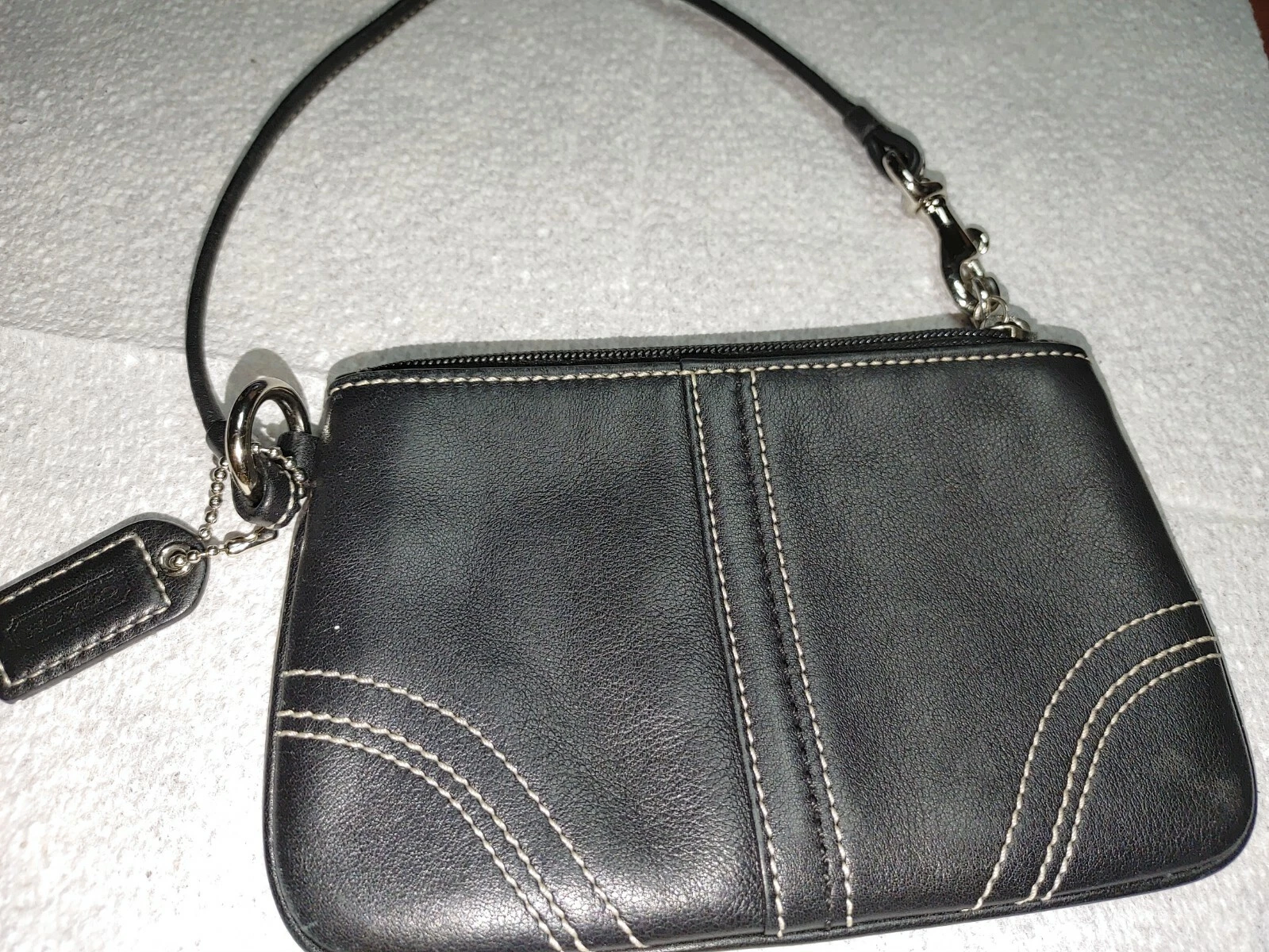 Portafoglio da polso donna Coach in pelle nera