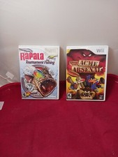 Nintendo WII Games Lot Looney Tunes Acme Arsenal & Rapala Tournament Fishing 
