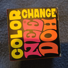 Schylling NeeDoh Groovy Glob Color Change Squeeze Toy, Yellow