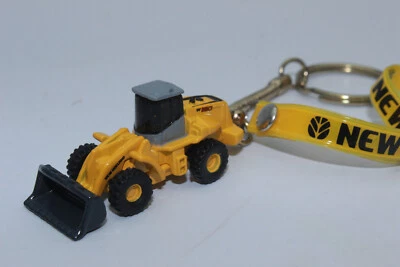 ROS 132.9 Porte-clés New Holland Chargeur Sur Roues Jaune En Métal Neuf - Photo 1/3