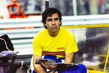 Eliseo Salazar reads a magazine in the pits Monaco GP at Circuit d- Old Photo