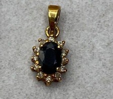 14KT, 12 GENUINE DIAMONDS & BLUE SAPPHIRE PENDANT