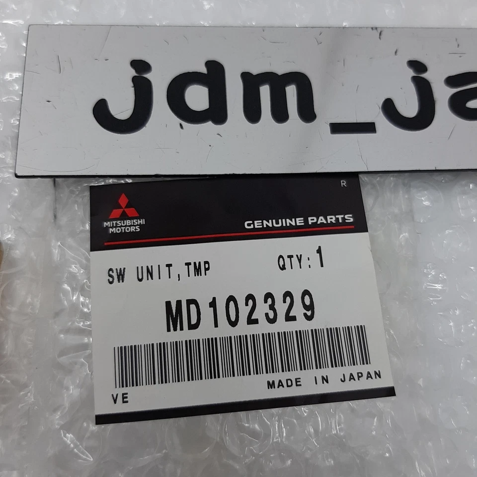 Sensor de temperatura MITSUBISHI MD102329 Pajero Delica genuino nuevo Japón Foto 3 de 4