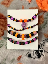 4Pcs Halloween Stretch Bracelets, Purple Orange Black Candy Skull - 6in