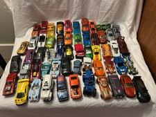 Lot of 50 matchbox and/or hot wheels toy cars.