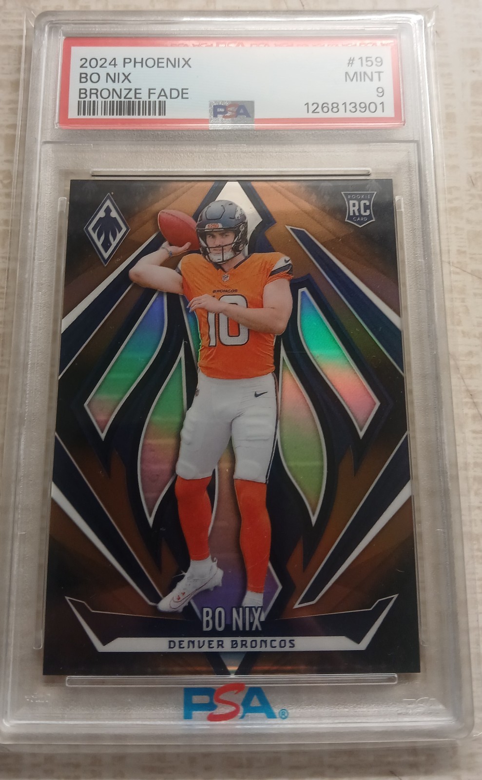 2024 Panini Phoenix - Rookies Bo Nix #159 Bronze Fade /125 (RC)