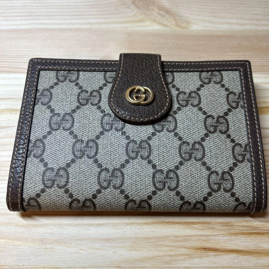 Portefeuille compact double pli cuir GUCCI vintage GG Supreme marron 4242