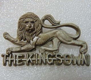 WW2 The King's Own Regiment Economy Issue (Plastic) Cap Badge