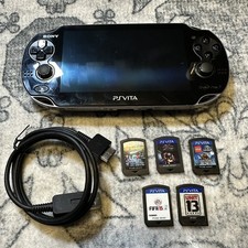 Sony Ps Vita 1000 PCH-1101 w/ charger and games 