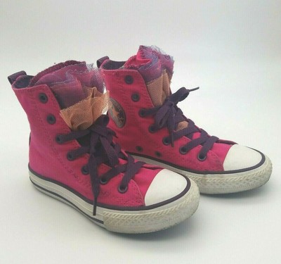 kids pink high top converse