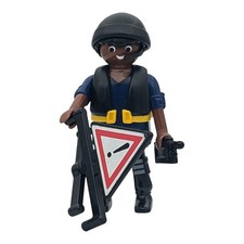 Figurine pompier bleu/noir signal radio incentive lâche Playmobil