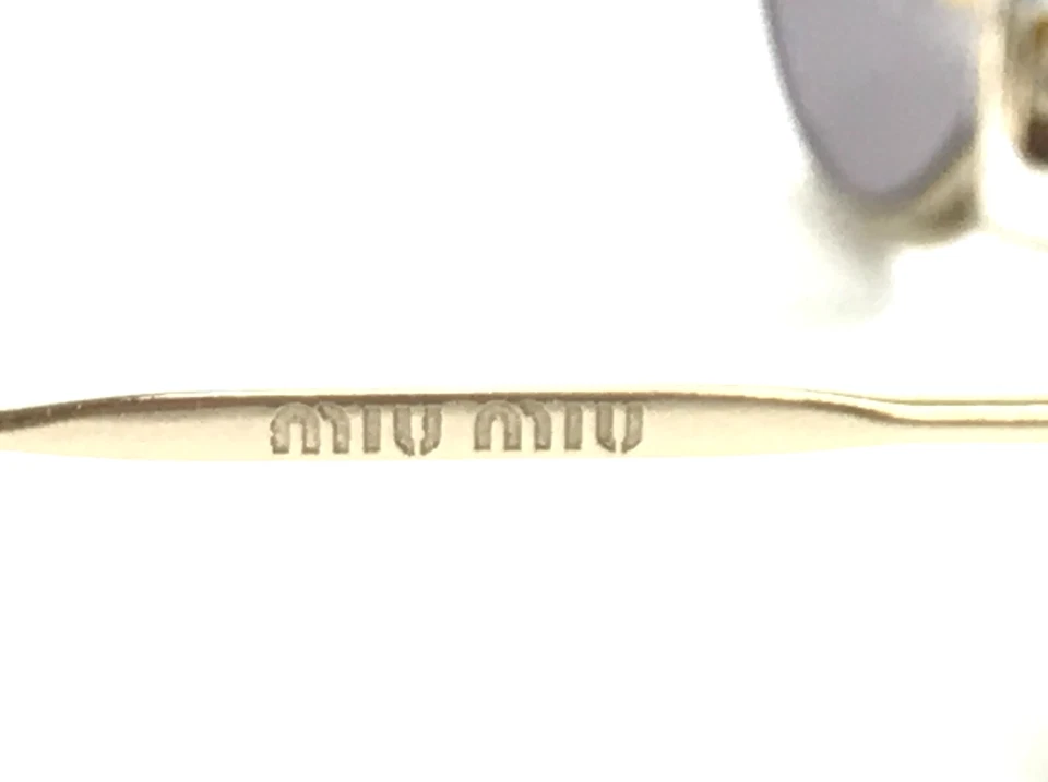 Gafas de sol Miu Miu SMU51T 4UD-085 rosa claro dorado ojo de gato con lentes púrpura claro Foto 4 de 4