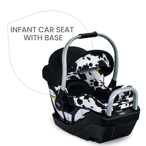 Black and white cow-print Britax Willow SC infant car seat with base, silver handle, and visible Britax logo.