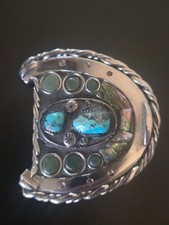 Silver and turquoise belt buckle