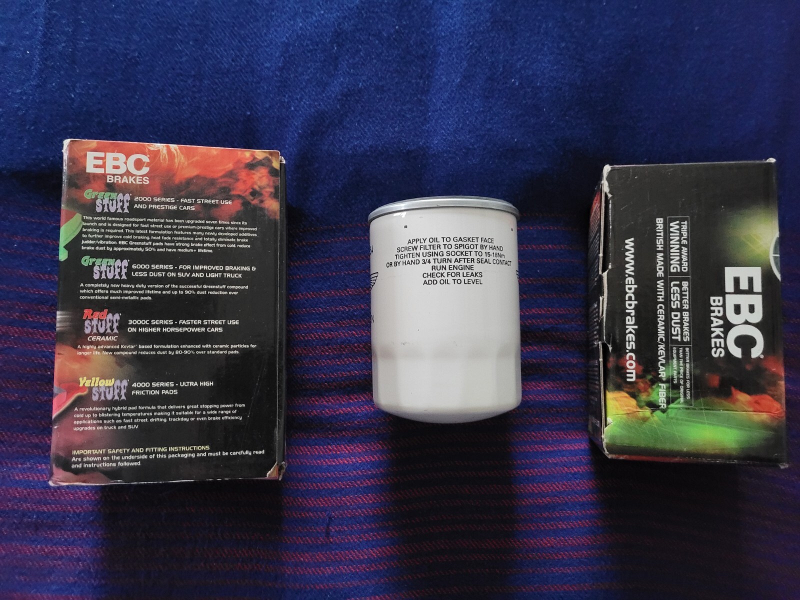 Aston Martin after market front & rear brake pads, and A/M oil filter. NIB. MINT