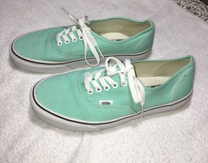 mint green slip on vans