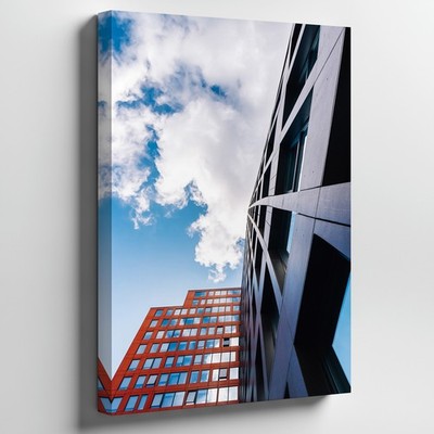 Dramatic Low-angle View Of Two Modern Skyscrapers Converging At A Sharp Wall Art